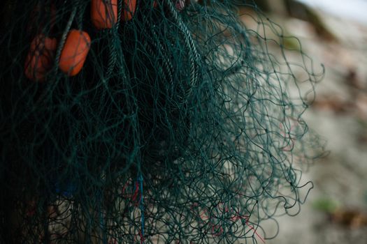 Background of color fishing net and cord rope laces line on the heap