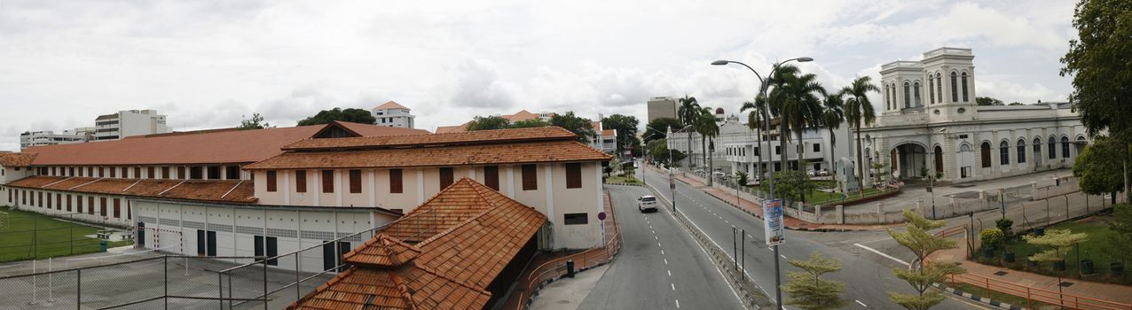 Penang, Malaysia architecture narrow streets. Dirty moldy humidity cityscape