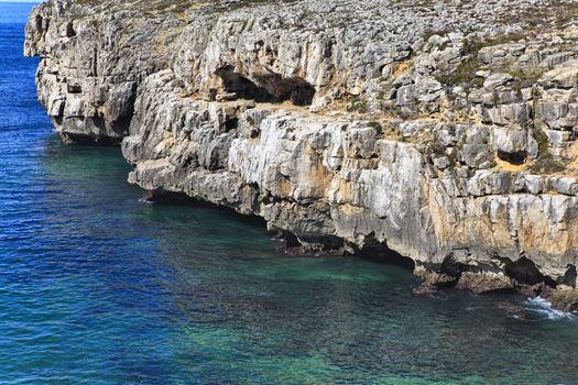 Rocky Coast Extending into the Sea