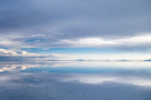 Sunset in Salar de Uyuni salt flats desert, Andes Altiplano, Bolivia