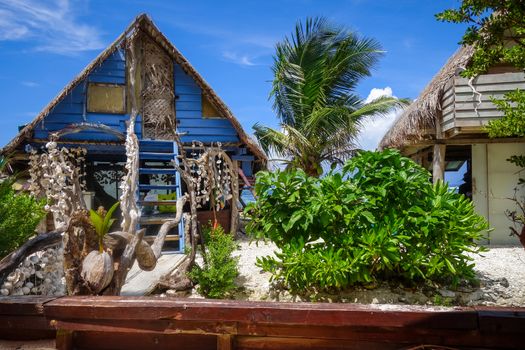 Traditional tropical hut the beach in Moorea Island. French Polynesia