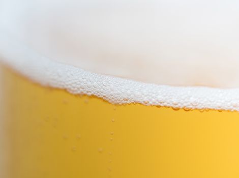 close up of beer bubbles