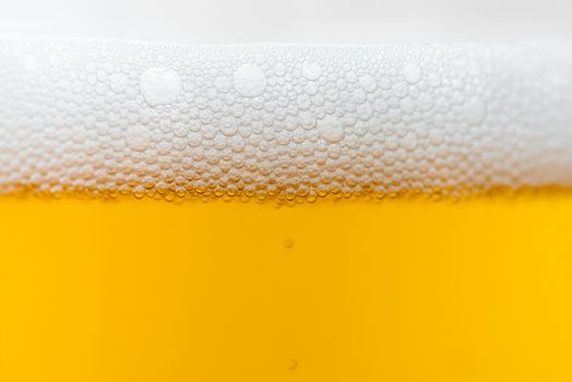 close up of beer bubbles