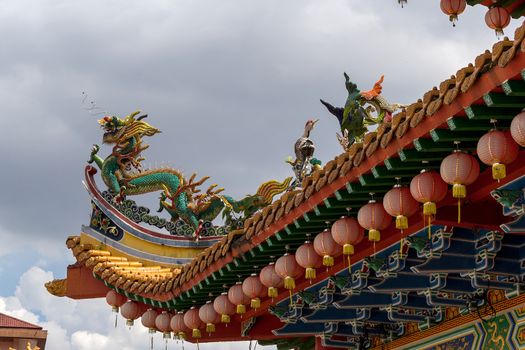 Dragon and Crane Mythical Creatures on Chinese Temple Roof Top