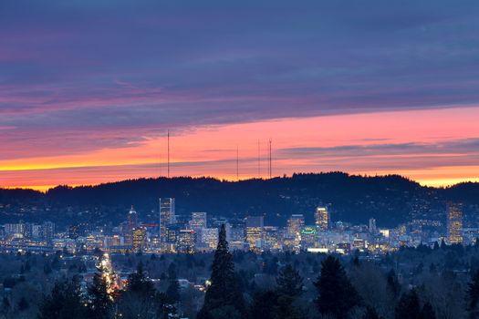 Dramatic colorful sunset sky over the city skyline of Portland Oregon