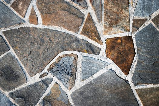 Background sandstone stone pavement of shapeless of pieces
