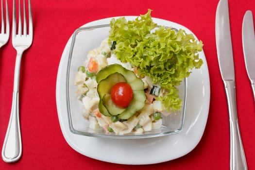 Salad with crab meat, corn and fresh vegetables. View from above