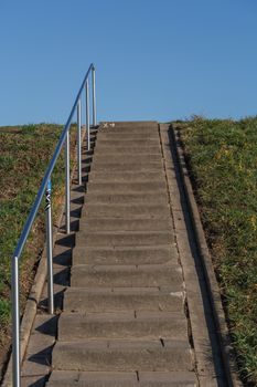 Stairs on the dike at Zons on the Rhine river in Germany.