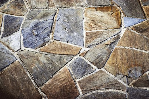 Background sandstone stone pavement of shapeless of pieces