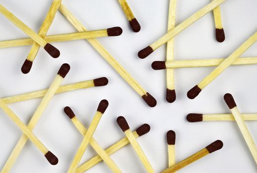 composition of spilled box of matches on a white background