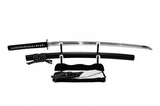 Japanese sword on stand with white background