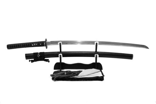 Japanese sword on stand with white background