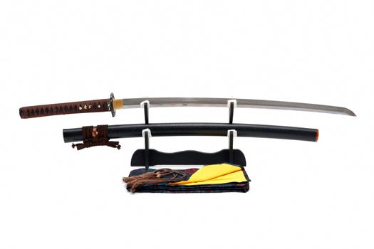 Japanese sword on stand with white background