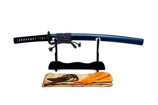 Japanese sword on stand with white background