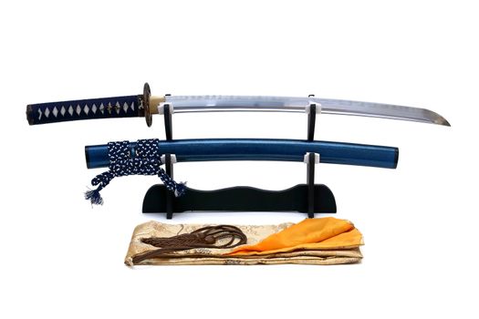 Japanese sword on stand with white background