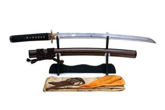 Japanese sword on stand with white background