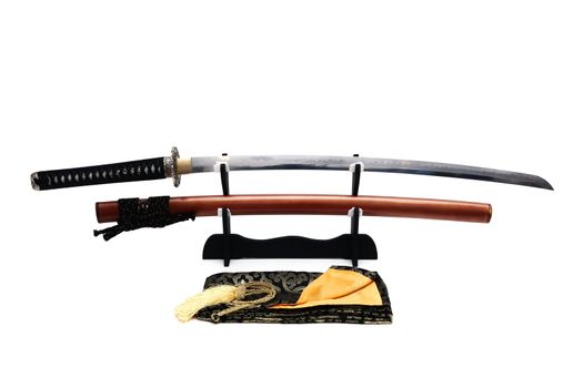 Japanese sword on stand with white background