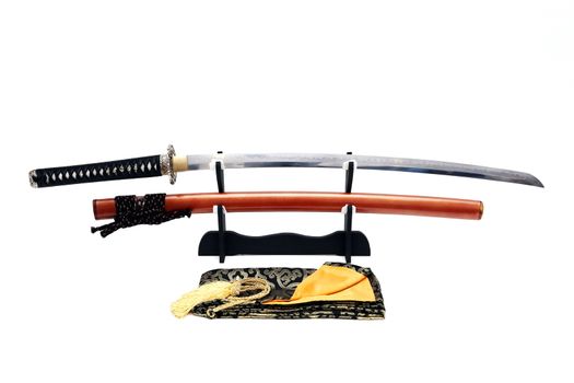 Japanese sword on stand with white background