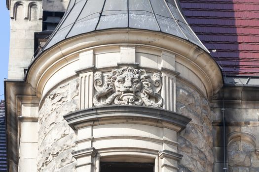 MOSZNA, POLAND - OCTOBER  07, 2016 :Details of facade 17th century  Moszna Castle on a sunny day.It  is a historic castle and residence located in a small village , one of the best known monuments in the western part of Upper Silesia.