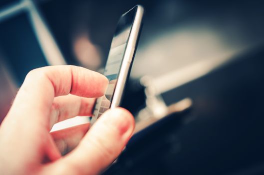 Daily Mobile Device Using. Mobiles Applications and Internet on the Go Photo Concept.