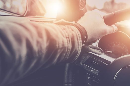 Relaxed Driver in His Modern Car on the Road To His Destination. Driving and Transport Concept.