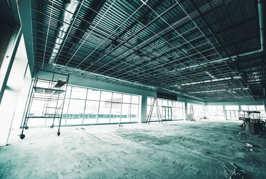 Warehouse Construction Site. Warehouse Interiors Under Construction. Commercial Remodeling.