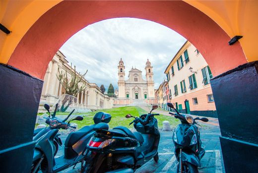 Basilica di Santo Stefano in Lavagna. City Street and Motorcycles. Italian Architecture.