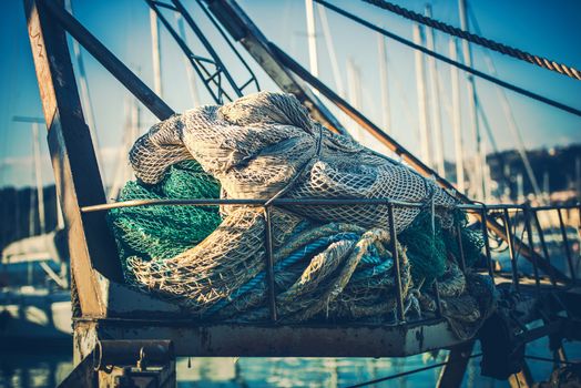 Fisherman Fishing Nets in the Marina. Fishing Industry.