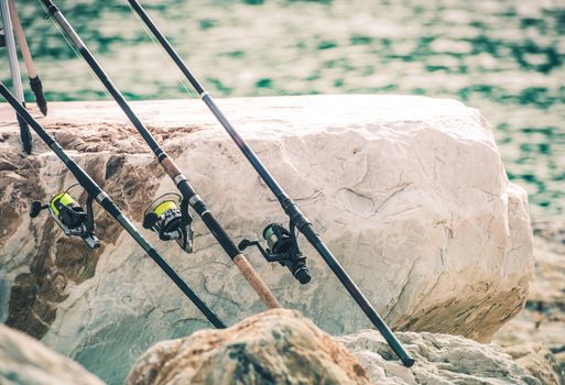 Fishing Rods on the Sea Shore. Fishing Concept Photo.