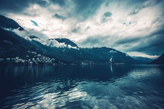 Norwegian Fjord Scenery. Scandinavian Landscape. Dark Blue Color Grading. 