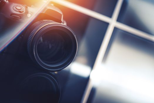 Photography Business Concept. Modern Digital Camera in the Photo Studio. Closeup Photo. 85mm Portrait Lens. 