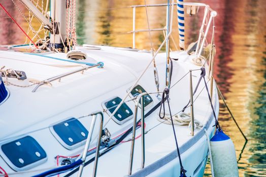 Yachting and Fishing Theme. Modern Yacht in the Marina Closeup Photo.
