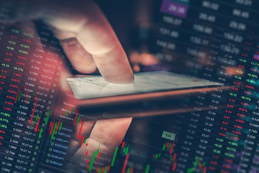 Mobile Forex Trader Concept. Checking on Global Currency Market While on the Go. Mobile Trading Application Conceptual Photo. Currency Trade.
