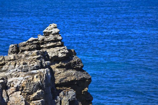 Rocky Coast Extending into the Sea