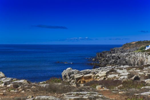 Rocky Coast Extending into the Sea