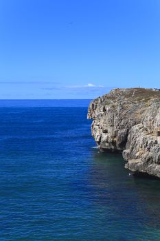 Rocky Coast Extending into the Sea