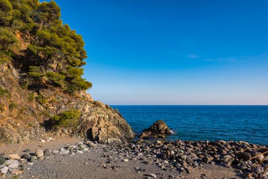 The Ligurian Coast between Varazze and Cogoleto,the stones beach typical of Ligurian coast.