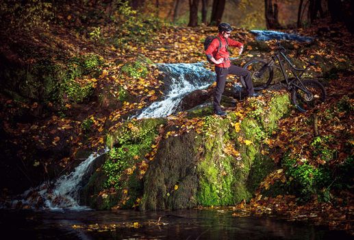Scenic Bike Trip During Autumn Foliage. Caucasian Mountain Biker.