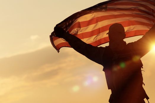 American Flag Celebration. Navy Soldier with United States of America Flag in Hands. Military Concept.