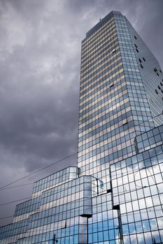 Blue Tower skyscraper on cloudy day Warsaw, Poland