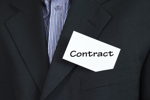 Contract text note concept over business man background