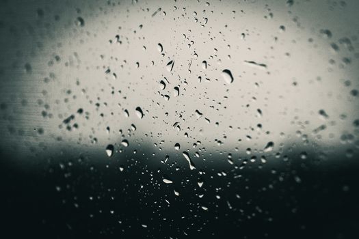 monochrome of rain on window