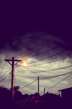 Street light at night with a stormy sky background. Dark mystery scene