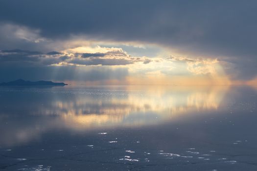 Sunset in Salar de Uyuni salt flats desert, Andes Altiplano, Bolivia