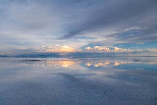 Sunset in Salar de Uyuni salt flats desert, Andes Altiplano, Bolivia