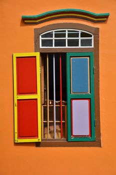 Colorful windows and details on a colonial house in Little India, Singapore