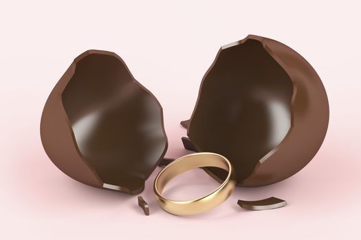 Broken chocolate egg with a surprise, golden engagement ring inside 