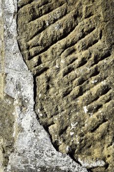 abstract background or texture fall of plaster on a stone wall