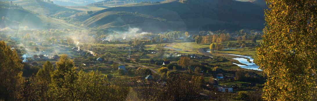 Village landscape panorama in the evening, Siberia, Russia