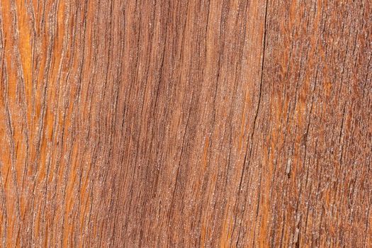 The photo shows a wooden texture background